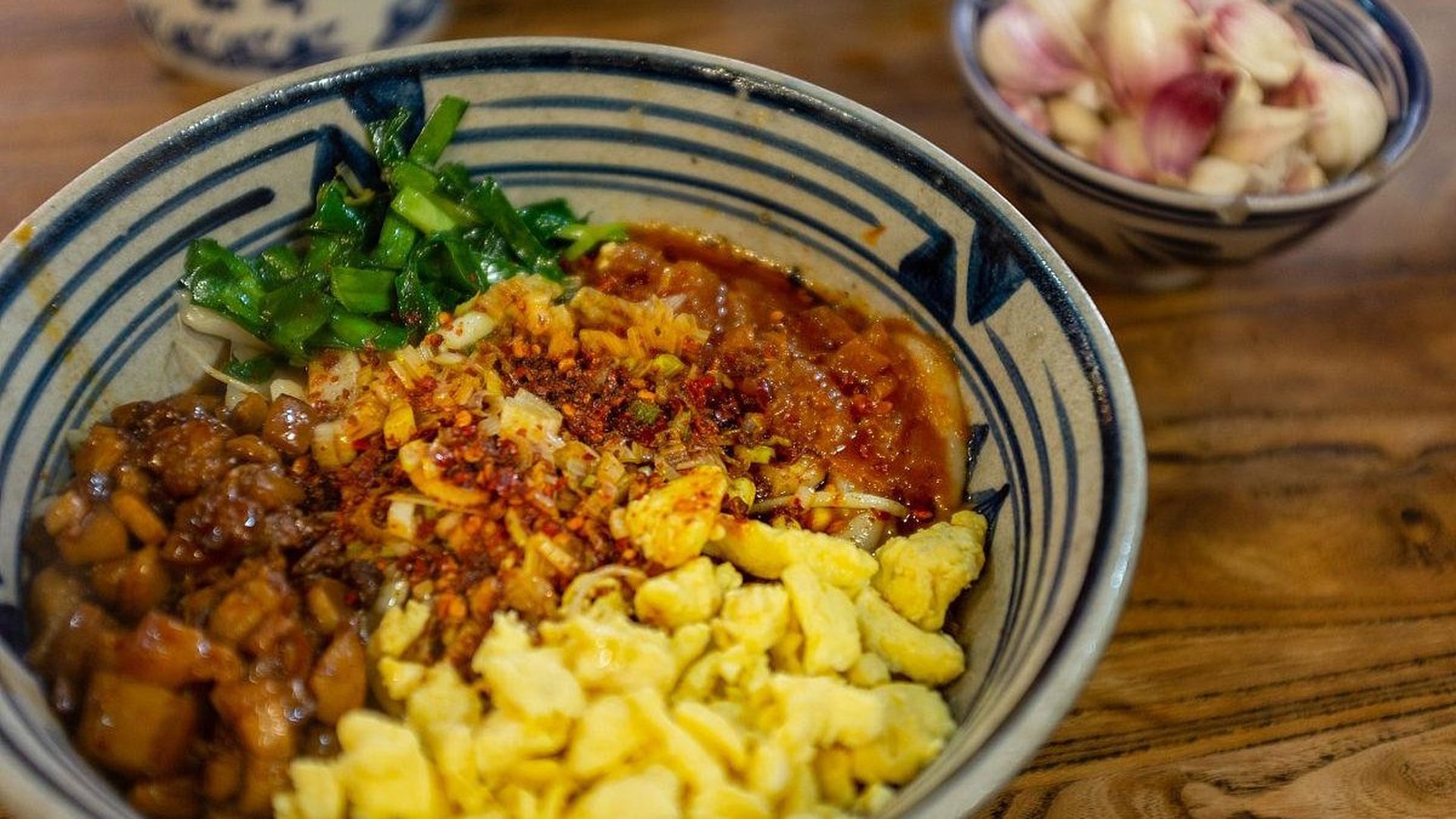 Xi'an street food dan dan noodles spicy pork bowl