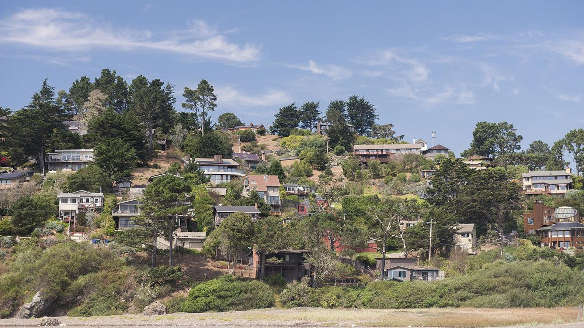 rural village in Anhui Province with traditional courtyard houses and wooden gates