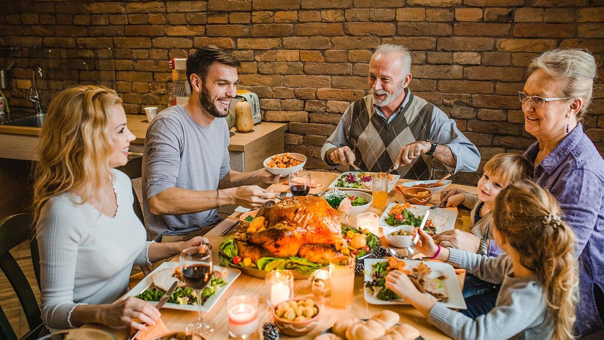 family-run trattoria in Tuscany, rustic dining room with wooden tables, people eating pasta, warm lighting, authentic Italian atmosphere