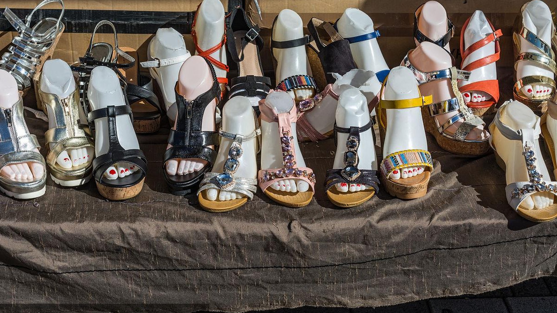 Rome street vendor fake ancient sandals plastic sh