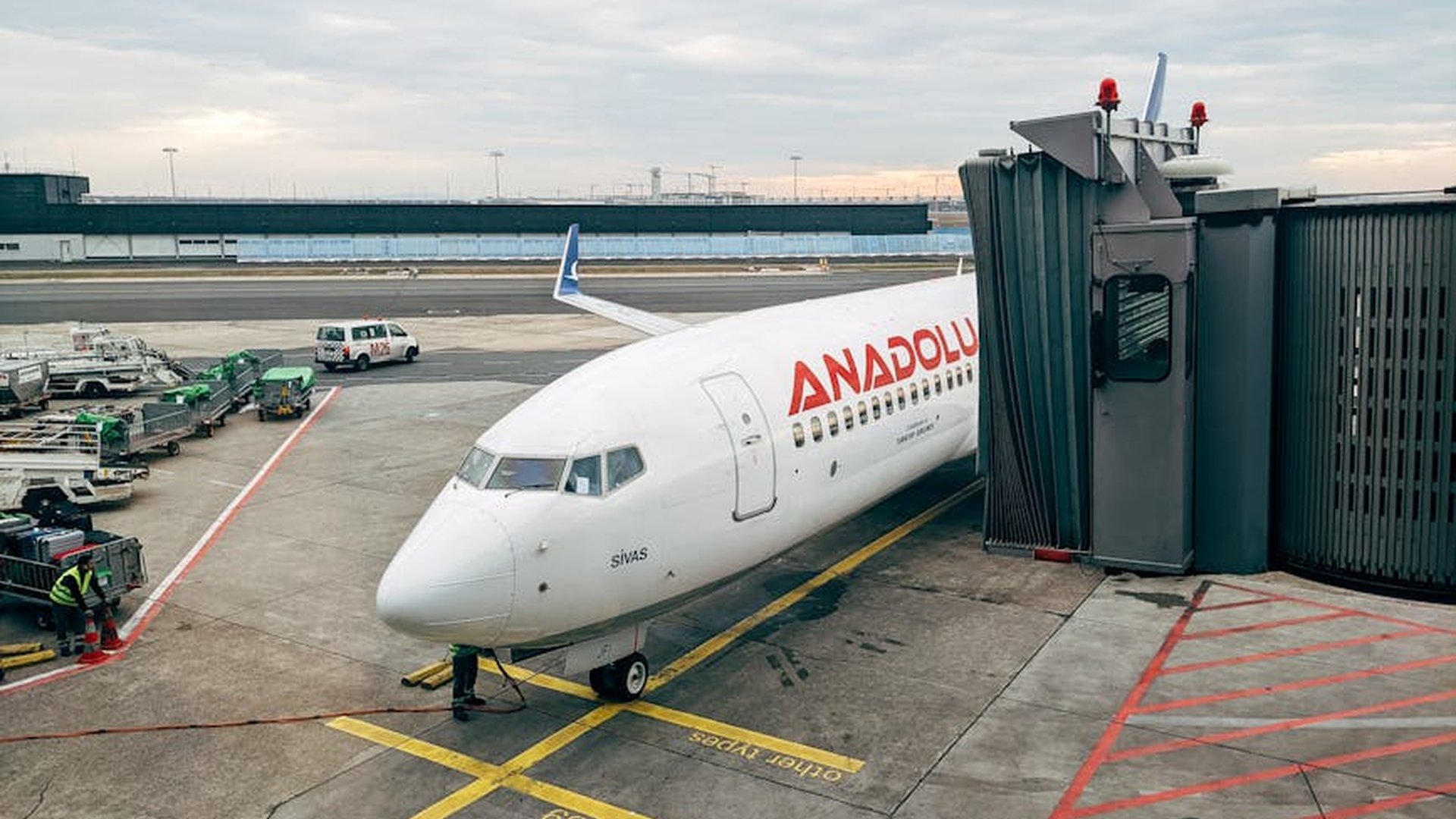 cheap flight hidden fees layover airport baggage f