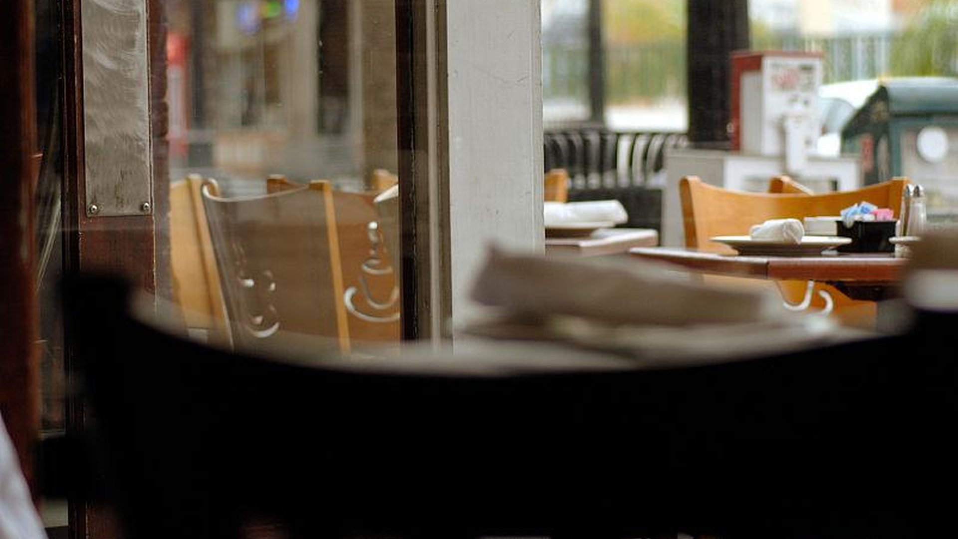 laptop café rain window red tiles blue apron small