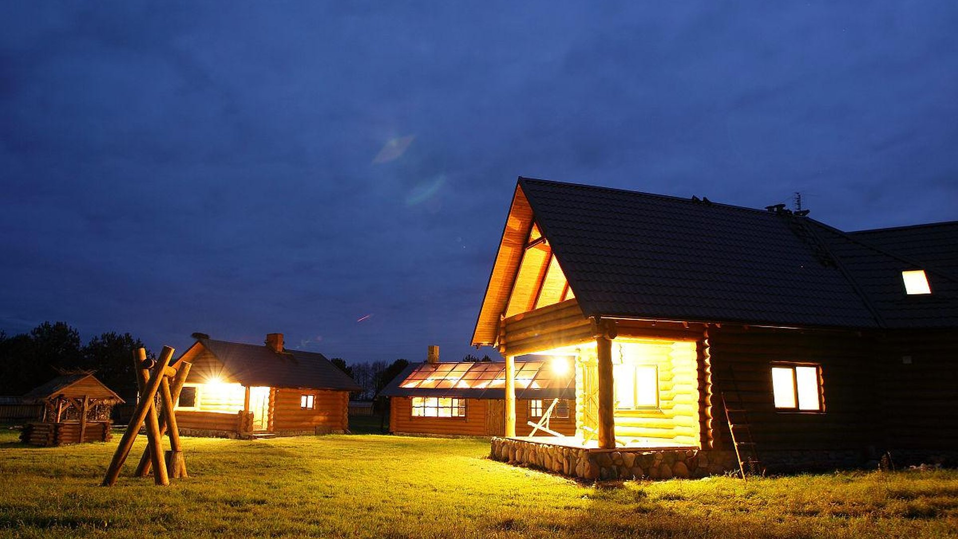 Zapotec village night scene, wooden homestay, corn